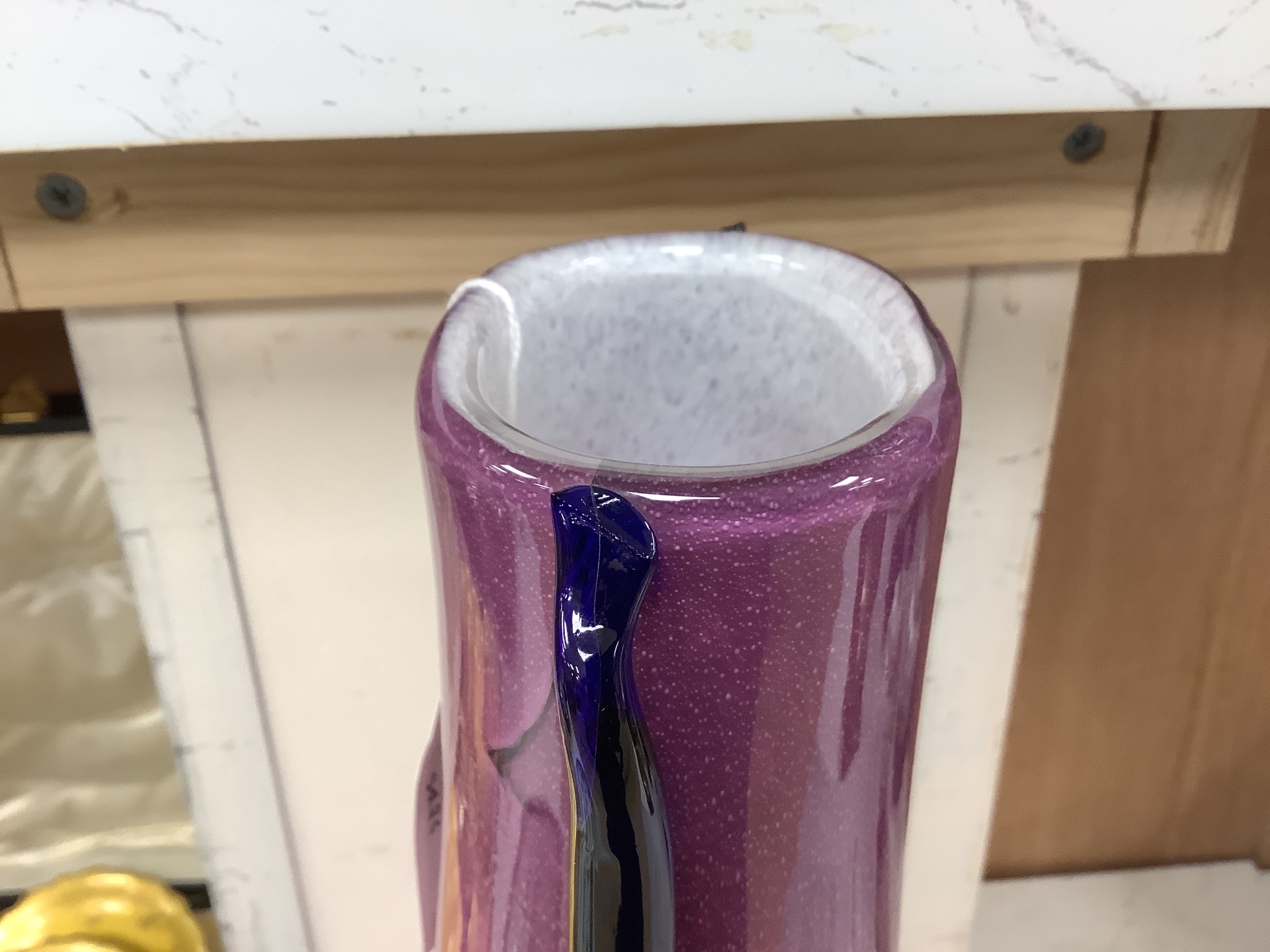 Elizabeth Graydon-Stannus, an unusual mottled pink and purple glass vase, circa 1930, of flattened pear form with applied blue lug handles, etched 'Gray-Stan' to base 44cm high